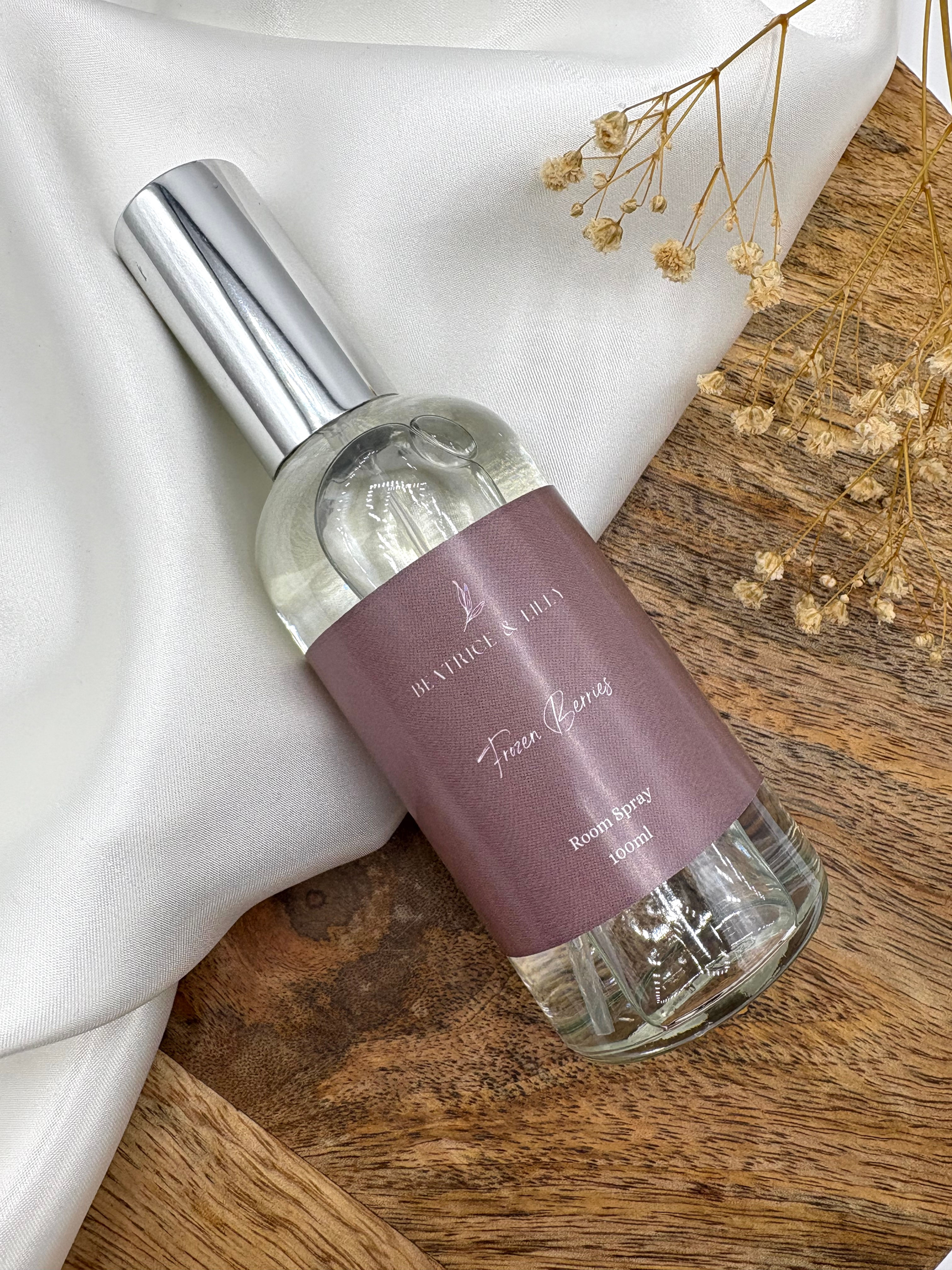 Frozen Berries Winter Christmas Room Spray, 100ml clear glass bottle with purple label and silver top.