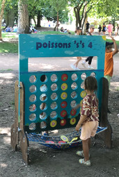 Child size 'Connect 4' game made from wood.