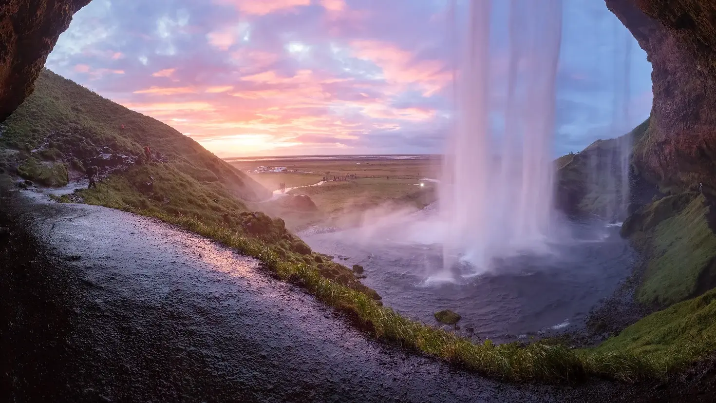 Cave view of waterfall in Iceland