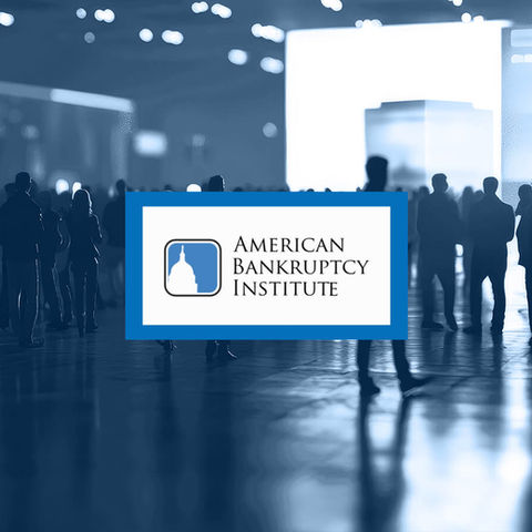 The American Bankruptcy Institute logo superimposed on an image of conference attendees