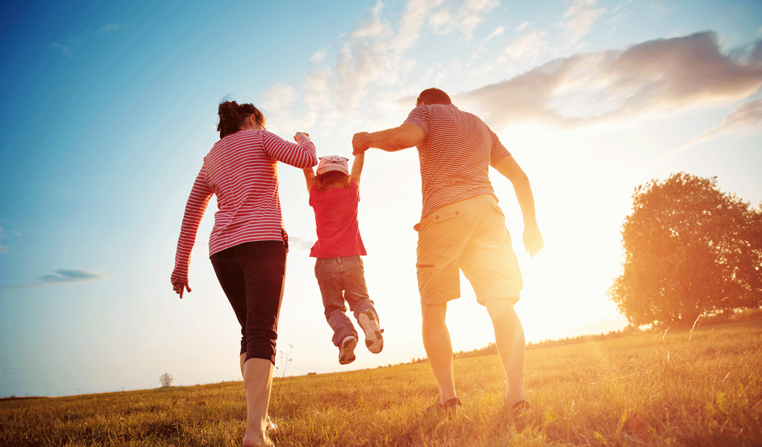 Family walking outdoors symbolising protection, security, and long-term financial stability