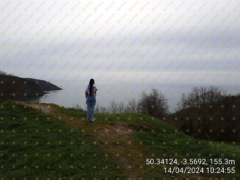 Woman Enjoying The View Of The Sea