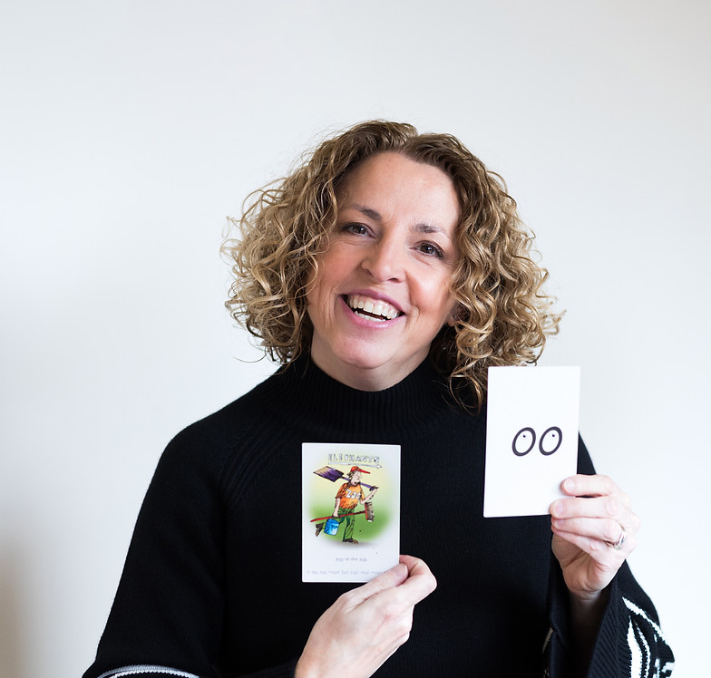 Lisa holding learning cards