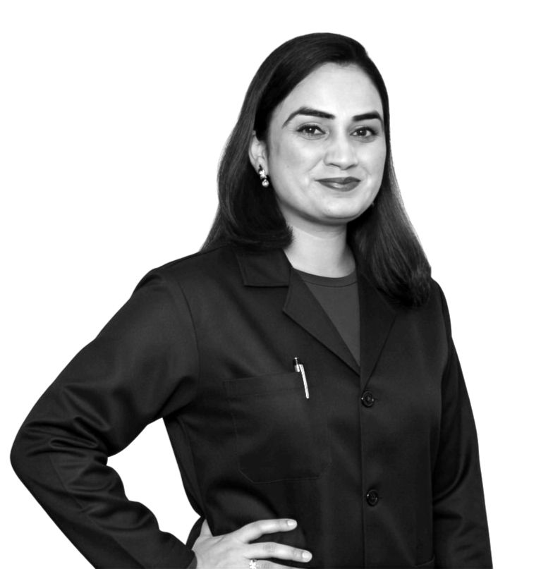 Amanpreet, Registered Dental Hygienist at Spinel Dental in Hamilton, wearing a dark blazer and smiling in a professional headshot