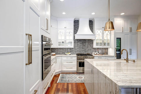 SW Portland kitchen remodel featuring custom cabinets, island & storage upgrades, custom hood, quartz countertops, new appliances, new lighting & fixtures