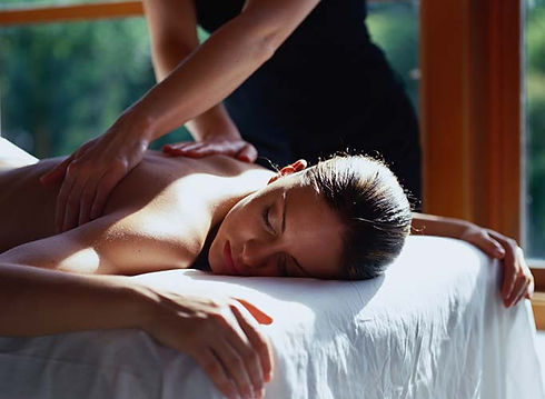 Client in Tamborine moutnai day spa having a massage from therapist