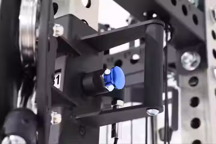 Eye-level view of a well-built multi-trainer in a home gym setup