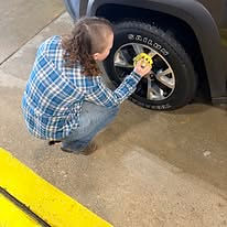 Owner Allison Getting that Wheel shine done with some exterior Detailing!