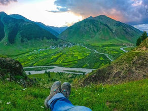 : Warwan Valley Kashmir — panoramic view of the remote valley surrounded by snow peaks