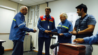 Prof. Harald Oye Giving Diploma to EMAL Employee