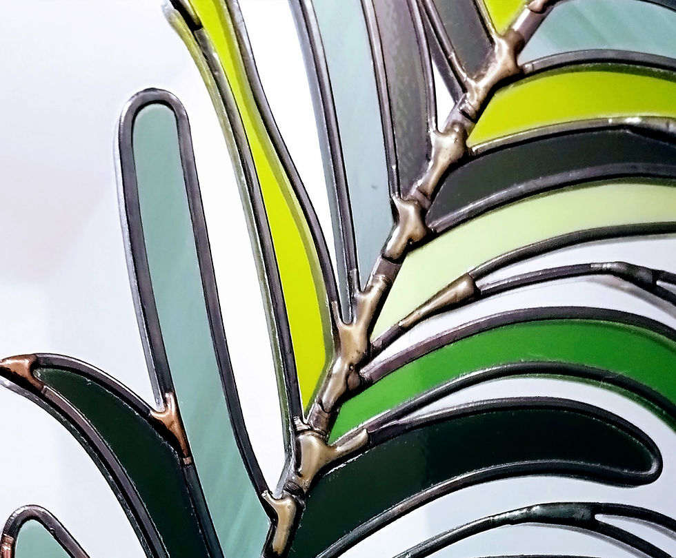 Thumbnail: Green foliage stained glass detail