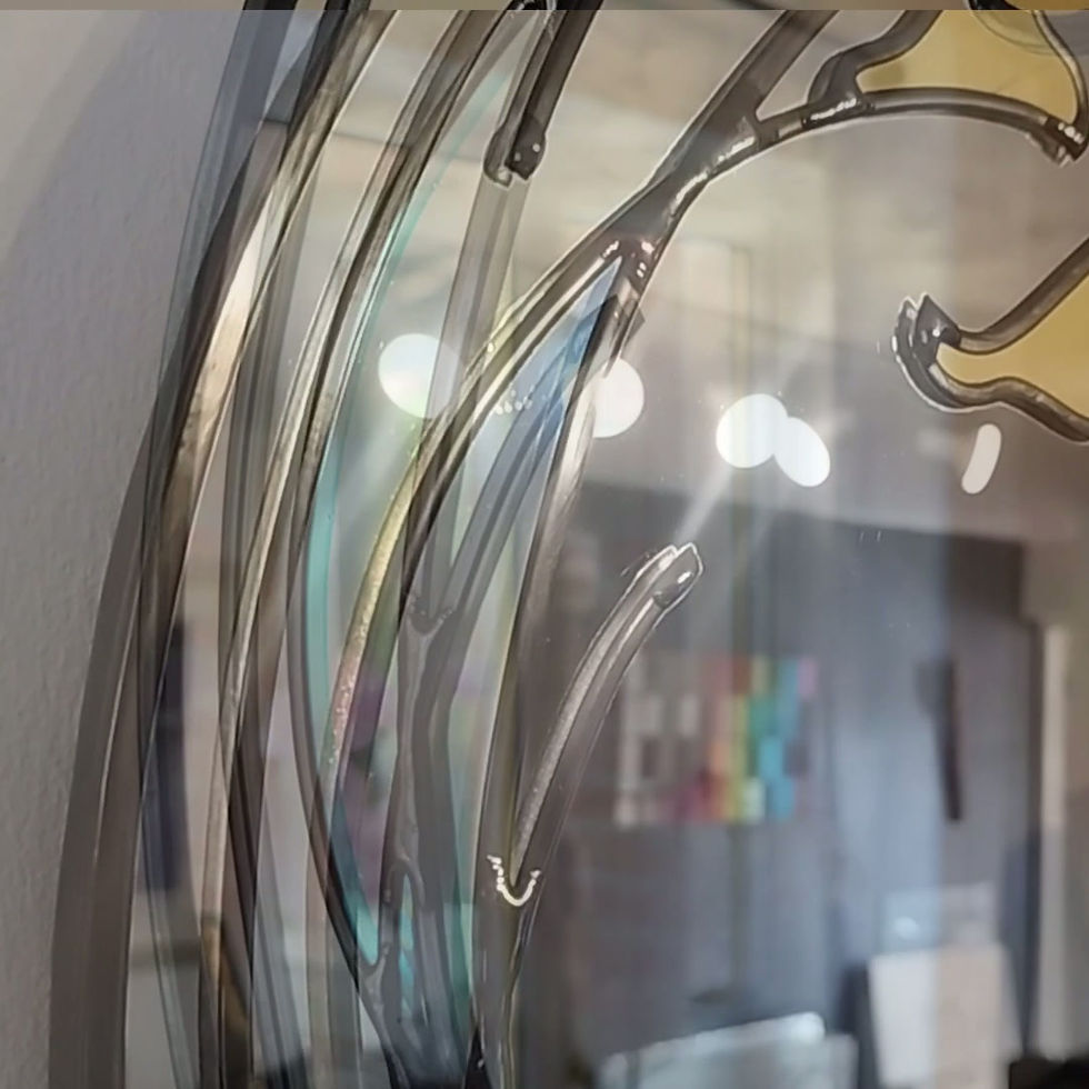 Thumbnail: Video of handcrafted Calla Lily stained glass round mirror with gold and iridescent pearl glass