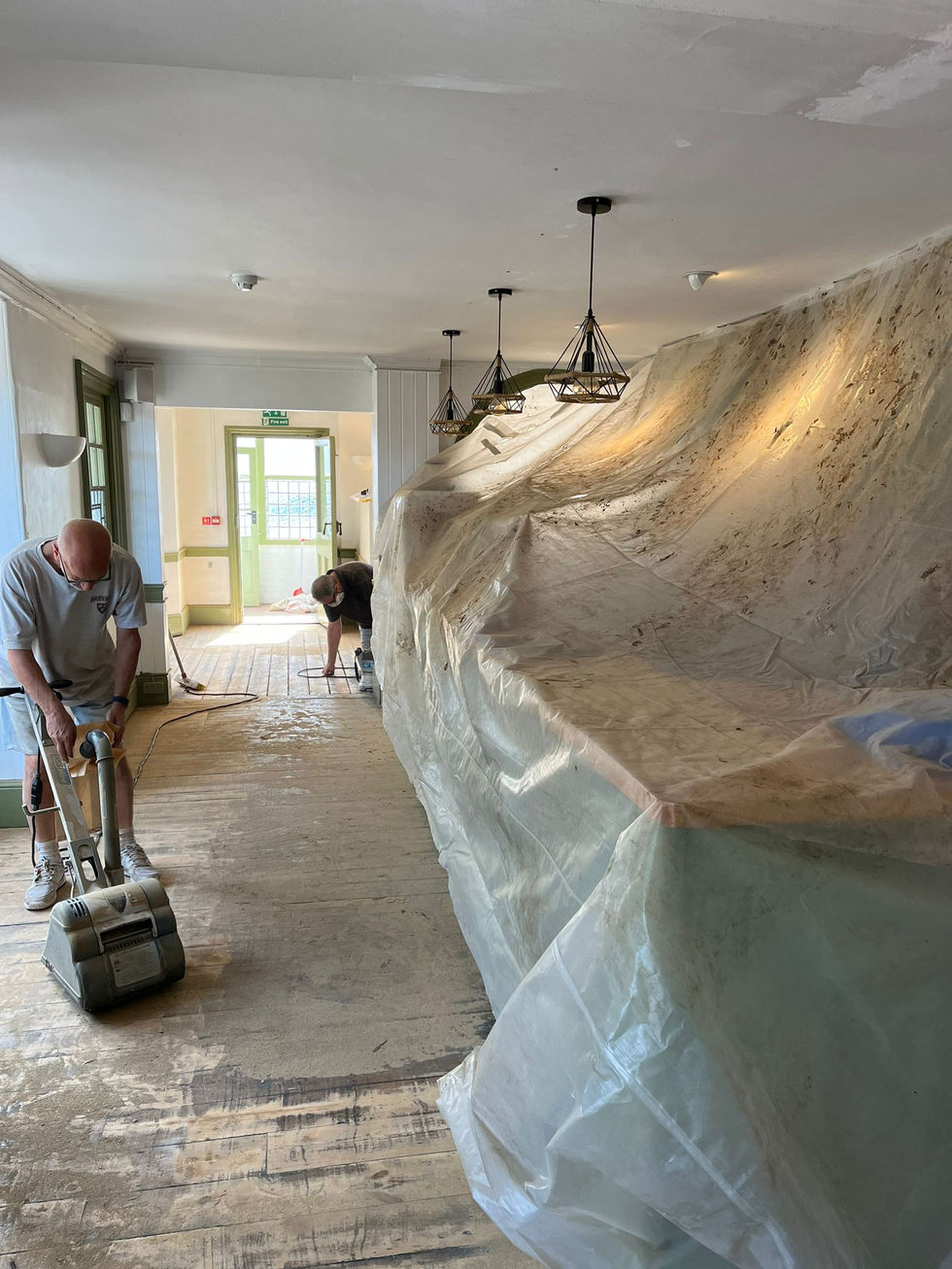 Sanding the floors was a dusty job