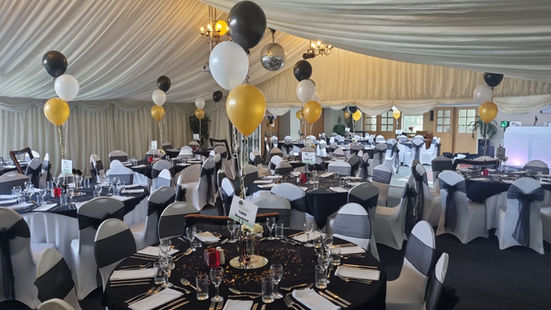 Elegant black, gold, white party venue