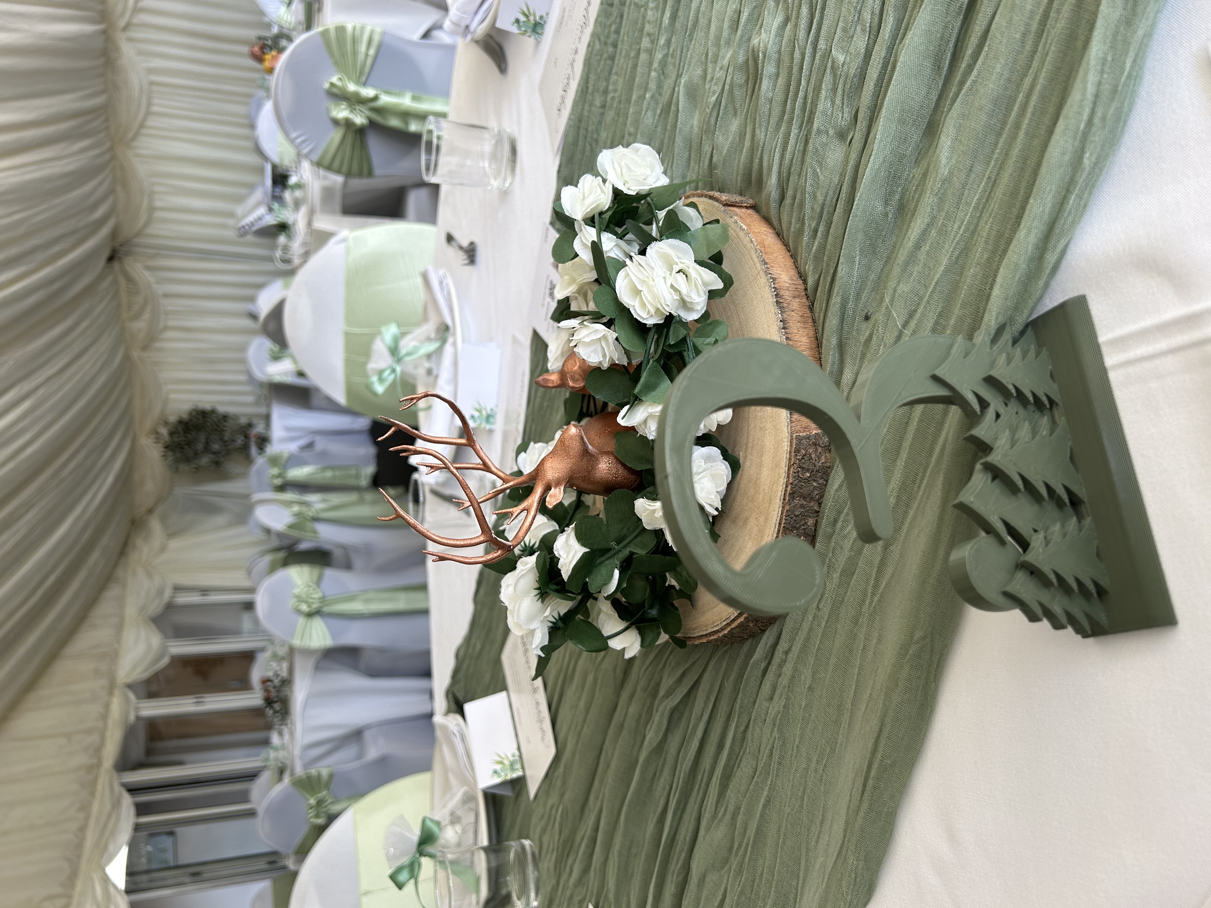 Rustic wedding table number two, deer centerpiece