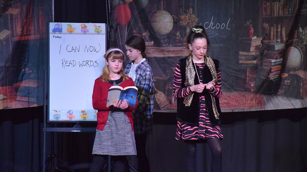 3 performers on stage