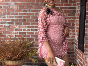 A girl wearing a pink outfit for valentine's day