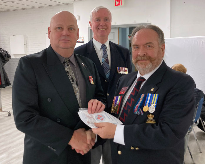 240203 - Bill Sergeant and President Paul Pirie inducting new VCB member Michel Cormier - 22 Feb 2024.JPG