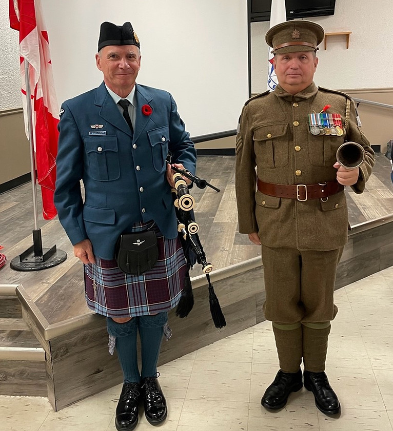 211110 - Piper HCol Rory Mackinnon and Bugler Tony Beresford at the VCB Remembrance Dinner