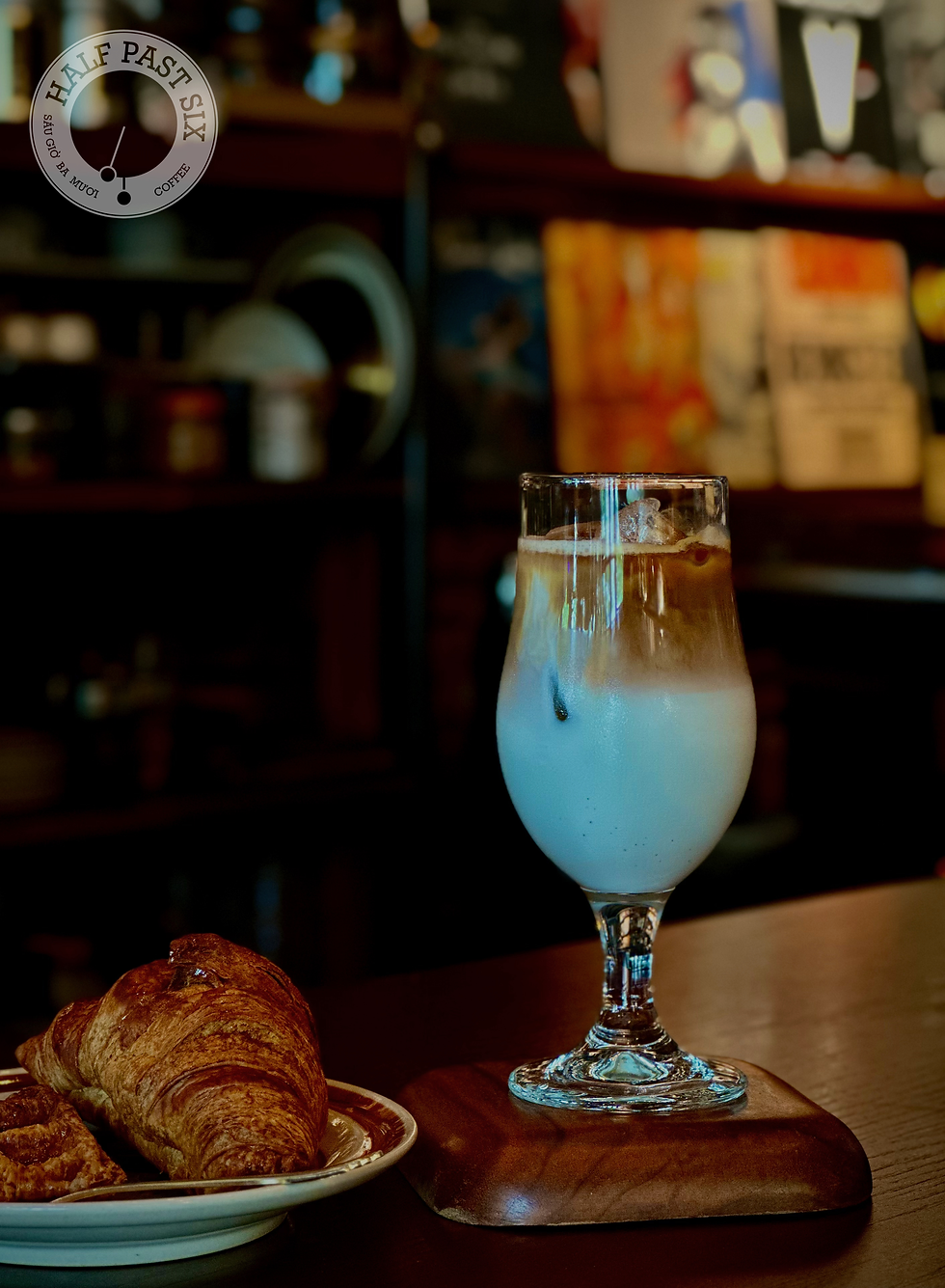 Icec caffé latte & croissant at Half Past Six coffee