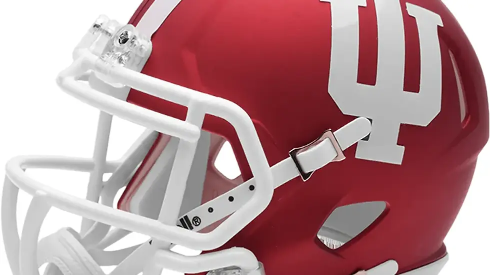 Eye-level view of the mini helmet displayed on a wooden shelf with Indiana Hoosiers memorabilia