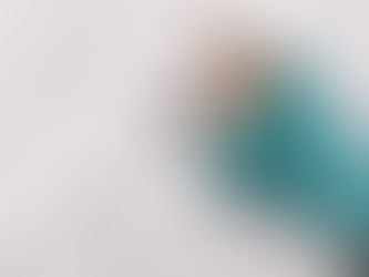 Dog in the snow looking vexed but not defeated.