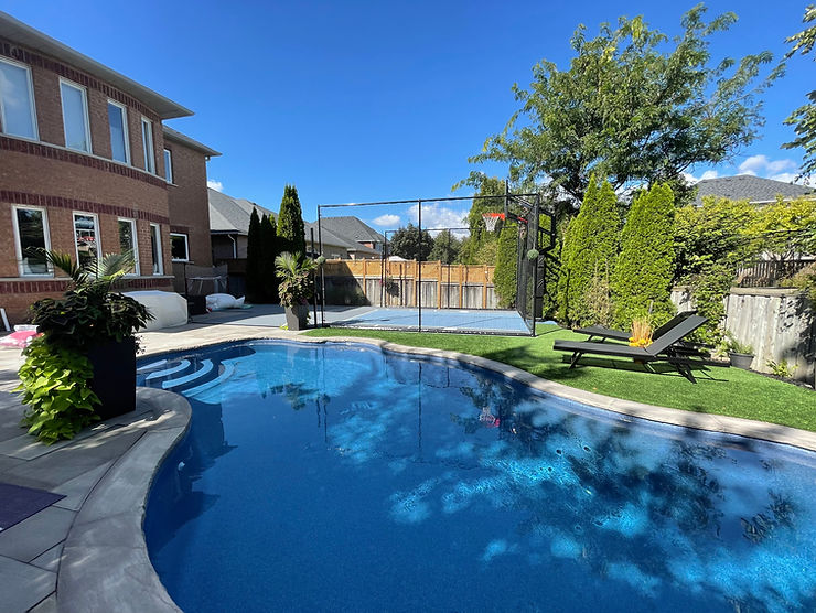 horvath-landscaping-backyard-freeform-pool-patio-lawn-privacy-evergreens-01