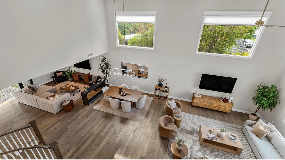 Overhead shot of a fully staged and styled living room, dining room and family room in an Arcadia Lite home for sale in Phoenix.