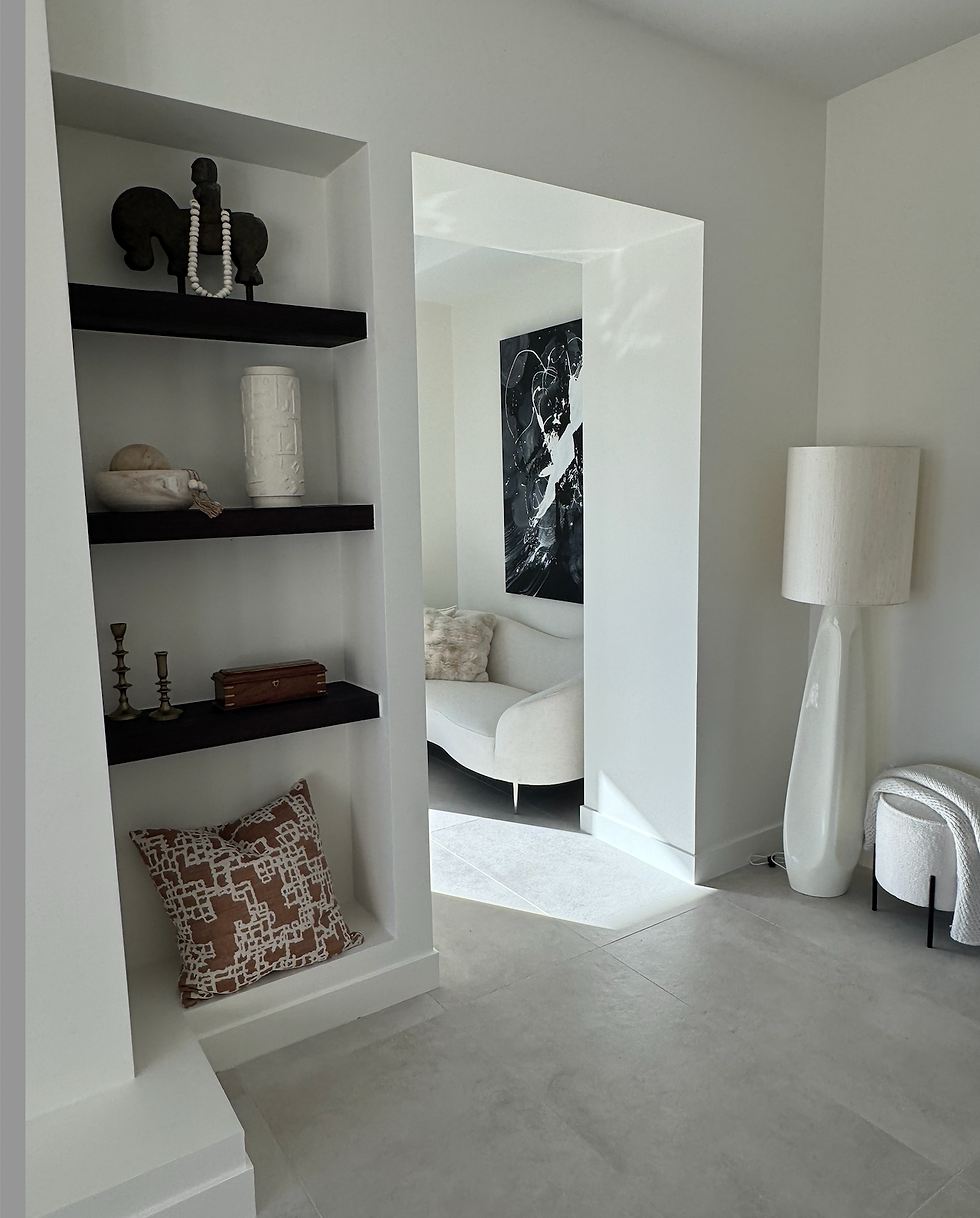 Luxury sofa and art in high end primary bathroom in North Scottsdale new construction.