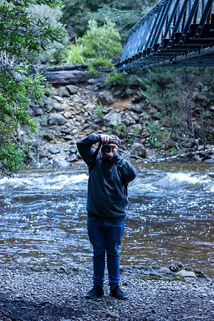 Dan having his picture taken while he's taking a picture