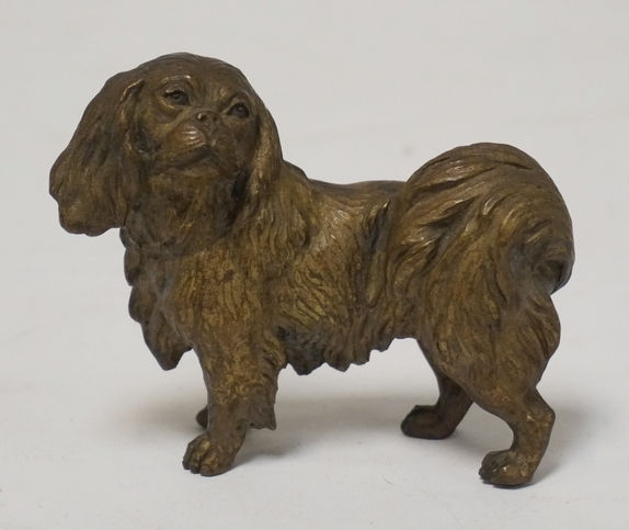 GILT BRONZE FIGURE OF A SPANIEL. 3 INCHES HIGH.