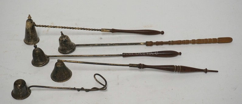 LOT OF 5 STERLING SILVER CANDLE SNUFERS. 4 WITH DELICATELY TURNED WOODEN HANDLES