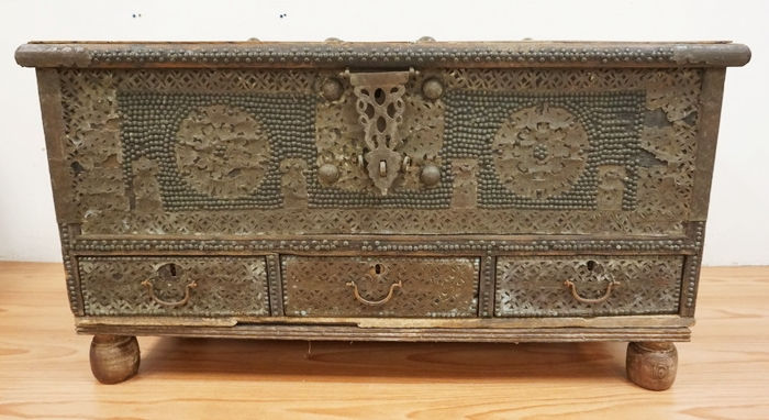 LARGE KUWATI CHEST WITH STUDDED DECORATION AND IRON HARDWARE. 46 INCHES LONG. SI