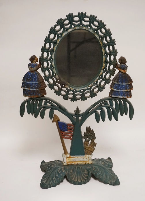 1191_CAST IRON JENNY LIND VANITY MIRROR WITH 2 FEMALE FIGURES IN BLUE DRESSES DE