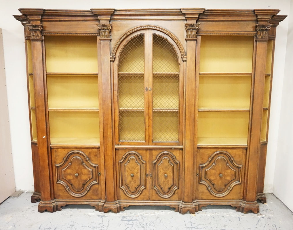 ITALIAN 3 SECTION BOOKCASE. CARVED PANEL DOORS AND COLUMNS. 88 INCHES HIGH. 120