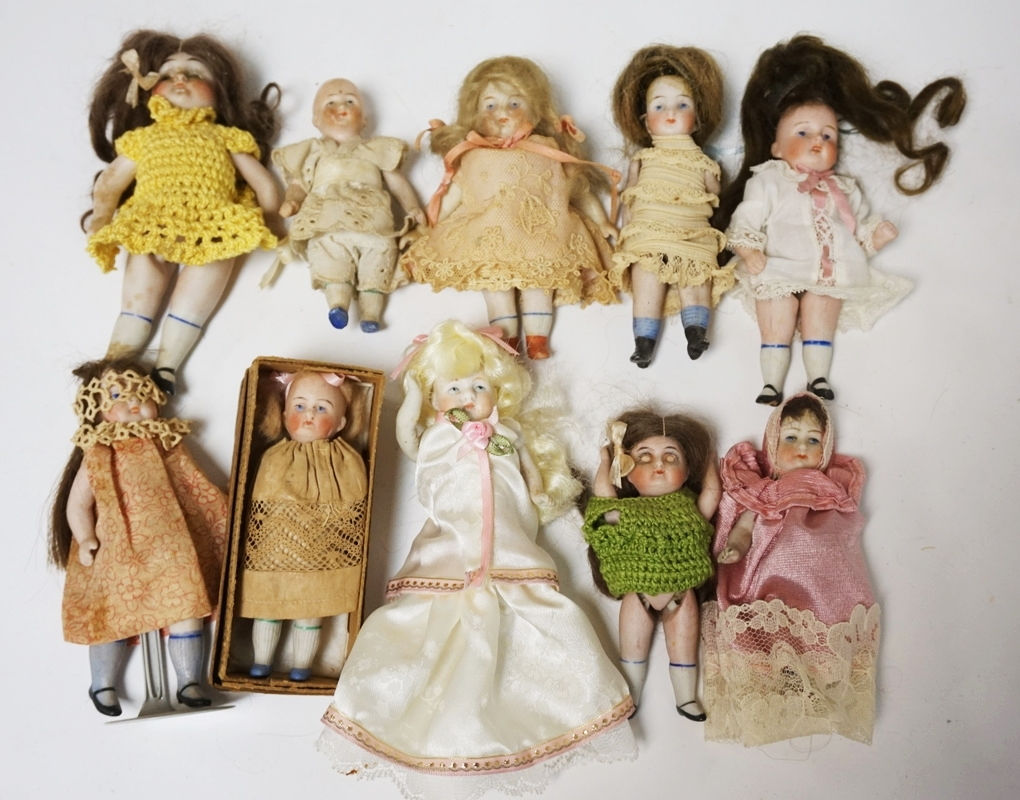 1271_LOT OF 10 MINIATURE BISQUE DOLLS. MOSTLY GERMAN. TALLEST IS 5 1/2 INCHES.