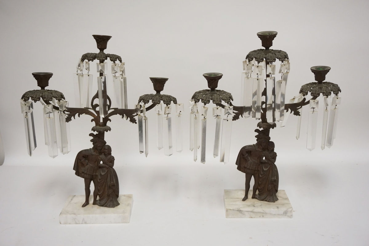 PAIR OF BRONZE GIRANDOLES IN THE FORM OF A COURTING COUPLE. 17 3/4 INCHES HIGH.