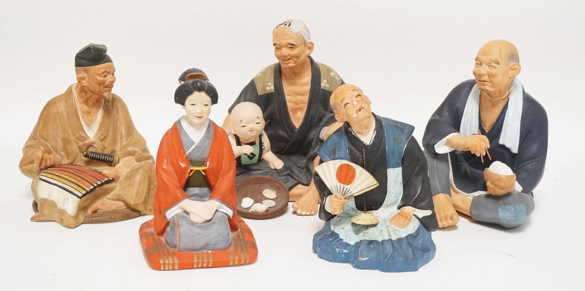 GROUP OF 5 HAKATA URASAKI CERAMIC DOLLS. TALLEST IS 8 1/2 INCHES.