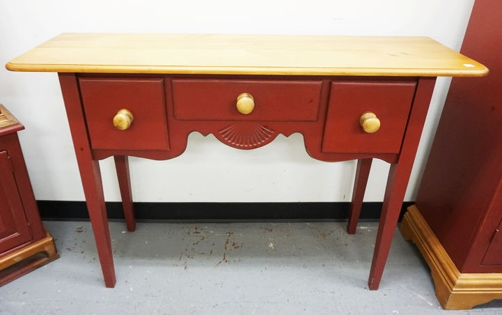COUNTRY STYLED CONSOLE TABLE. PINE WITH RED PAINT. 3 DRAWERS WITH SHELL CARVING.