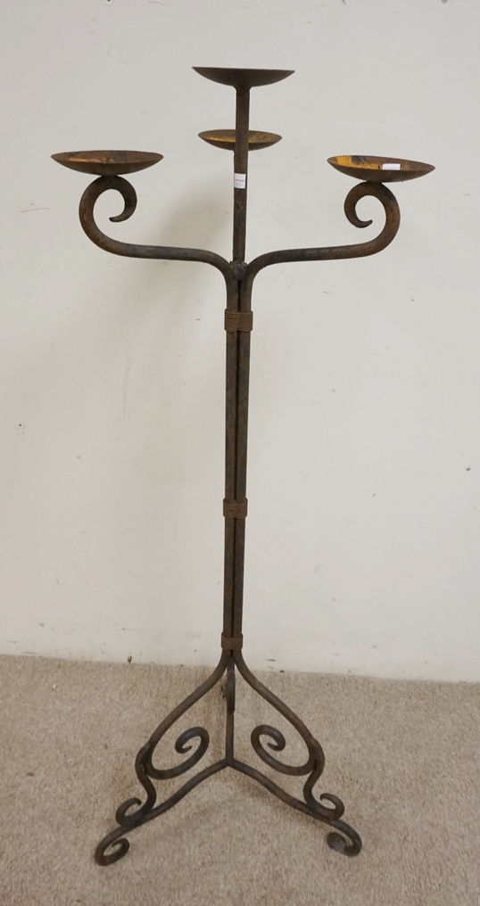WROUGHT IRON PRICKETT STICK WITH 4 CANDLE HOLDERS. 50 1/2 INCHES HIGH.