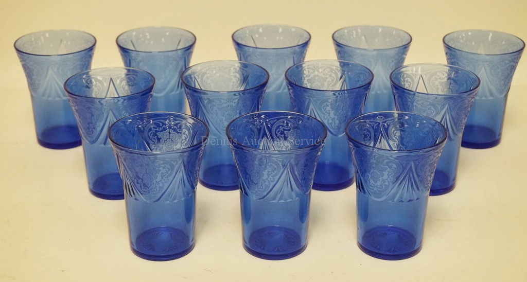 12 HAZEL ATLAS COBALT BLUE ROYAL LACE TUMBLERS MEASURING 4 1/8 INCHES HIGH.