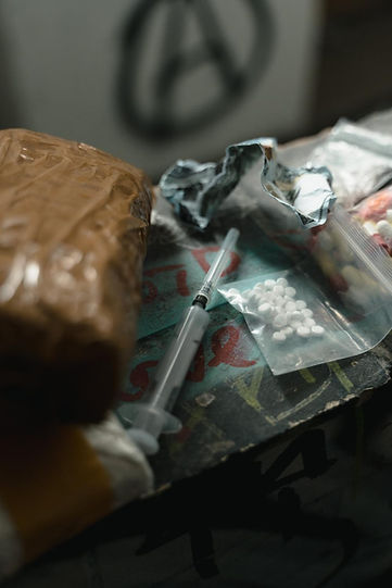 Addiction - Showing drugs and alcohol to portray addiction