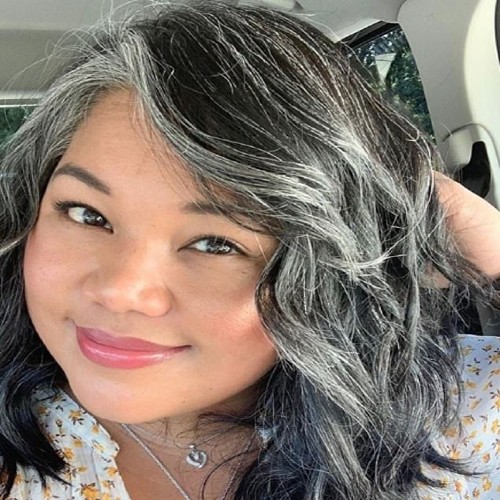 Asian woman loving her hair