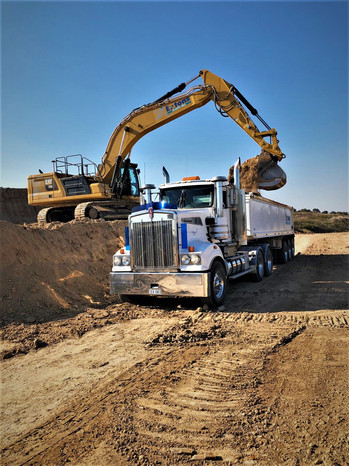 Truck loading clay liner.jpeg