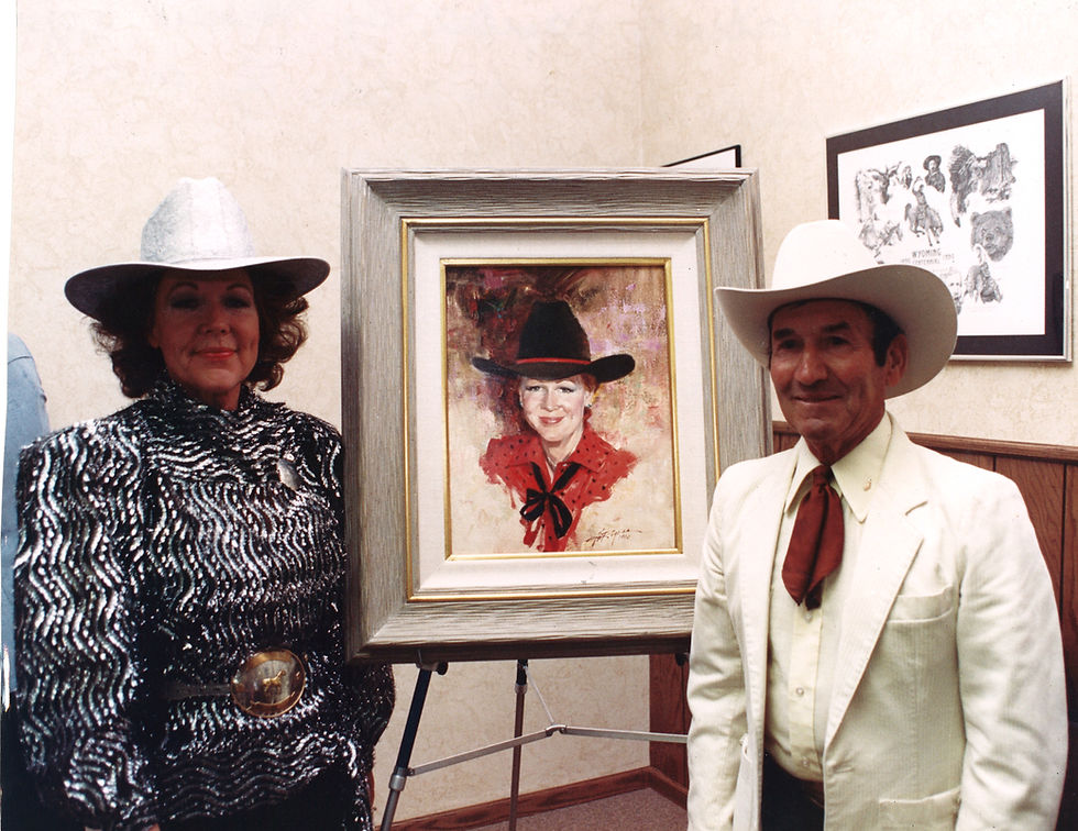 Don and Arlene with HoF Portrait.jpeg