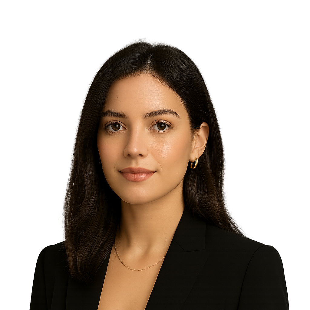 Young woman in a black blazer looking directly at the camera. Professional portrait.