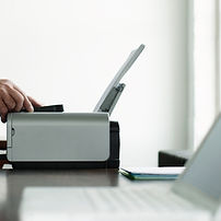 Man Using Computer Printer