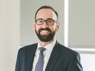 Headshot of Callum Ross, a lawyer in the Environment and Real Estate teams at Mills & Reeve.