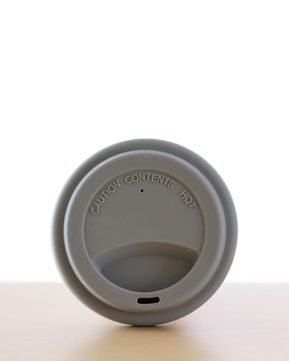 Miniaturbild: Kaffeebecher mit Deckel und Zitat Grau / Weiß