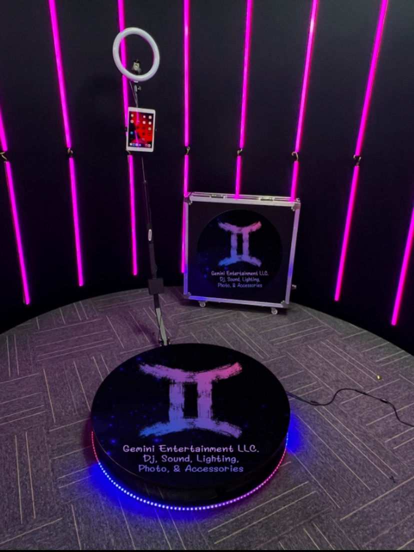 Photo booth props including hats, glasses, mustaches, and ties.